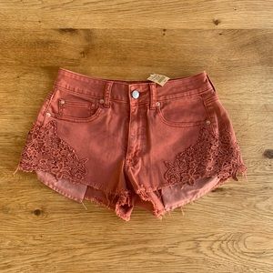 Red Rust Denim American Eagle shorts with embroidery